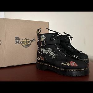 Dr. Martens embroidered combat boots with accent toe buckle. Women’s Size 9.